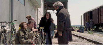 Isabelle Huppert, Patrice Chéreau, Béatrice Dalle. "Le temps du loup", Michael Haneke, 2003[/caption]